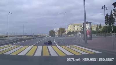 Grandpa runs into lanes at red light. Russia...