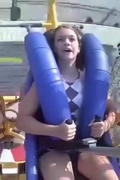 Little neighbor Suzy tries to wrestle a pigeon with her face but appears not to have what it takes 