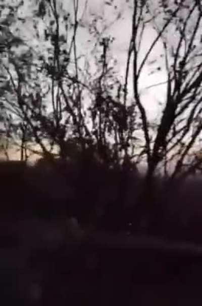 A Russian soldier films a Ukrainian T-64BV tank up close as it approaches their position and begins firing at it.