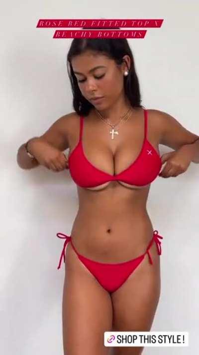 Top-heavy gal in a red bikini