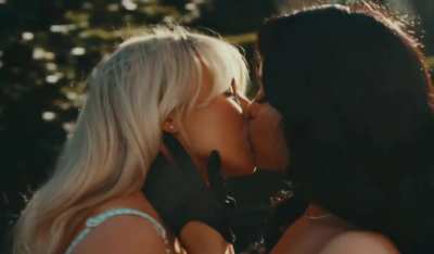Jenna Ortega kissing Sabrina Carpenter
