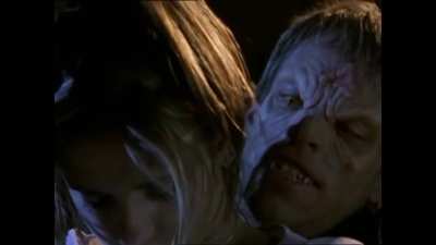 Mainstream: Buffy is crushed in a rear bearhug
