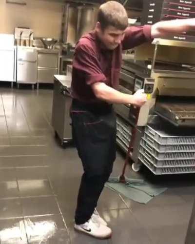 Kid's got swagger on wet floor and no no-slip shoes