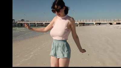 Giulia Wylde on the beach