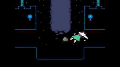 Ralsei trips over a rock