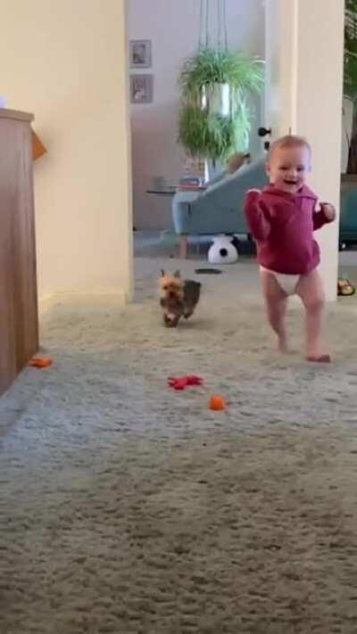 Letting my nephew play with a tennis ball launcher