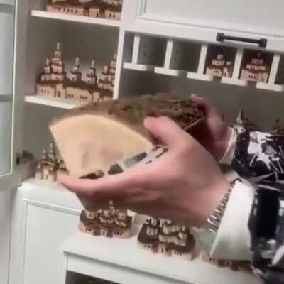 Hidden village inside a log