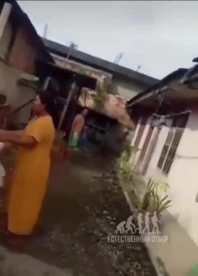 Fool messing around with a snake (Volume warning)