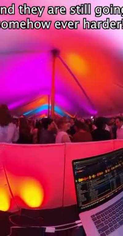 The crowd helps out a DJ