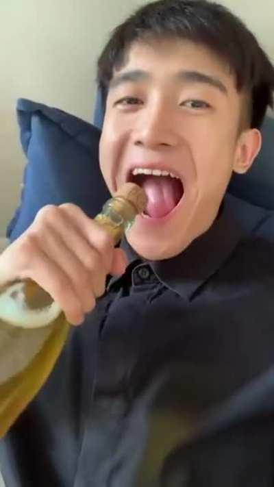 Opening champagne with teeth