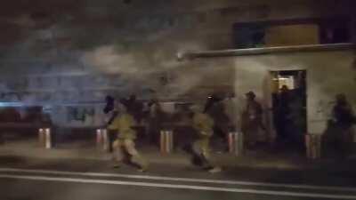 Guy tries to ambush police with a hammer, gets taken down.