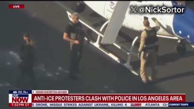 A Blackhawk helicopter just landed near the DHS building in Compton to resupply federal agents...