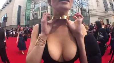 Gemma Arterton totally just wants to show you her choker...but that reporter deserves a raise too!