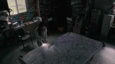 Claudia Bueno layers 60 painted glass panels for this effect with light