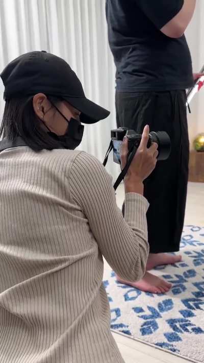 Asian photographer in her panties for a BTS porn shoot
