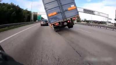 Motorcyclist close call with a lorry