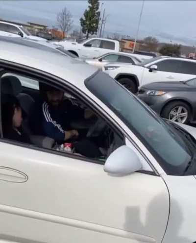 Couple nodded out in shopping mall parking lot