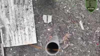 Ukrainian drone drops grenade down smoke stack. Ukraine 2022