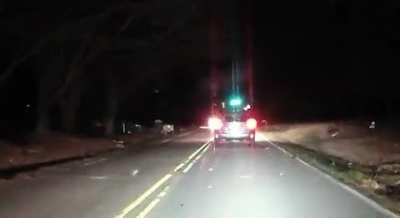 Car Hits Deer, sends him spinning.