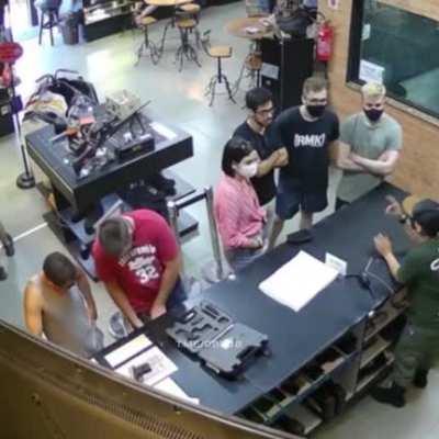 Good friends always help out when testing a gun.