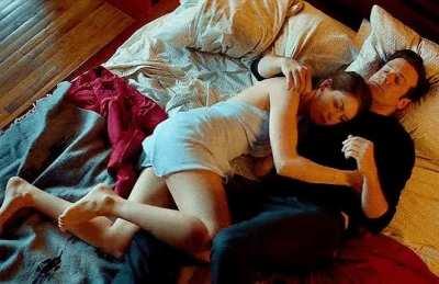 Cuddling up to a leg in “Sleeping with Other People” (2015)