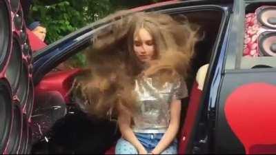 Bass makes her hair vibrate to the music