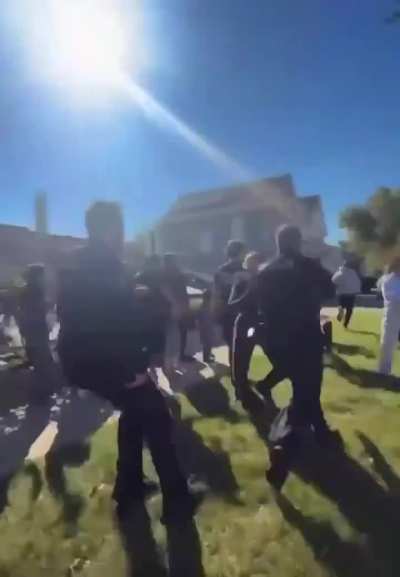 Aurora, IL: During an ICE operation earlier today, a man was filmed striking and shattering the rear window of a federal vehicle.