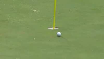 Jon Rahm skips the ball across the pond for the hole-in-one!