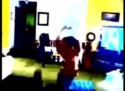 Bob Wicks harvests the drippings of freshly baptized toddlers