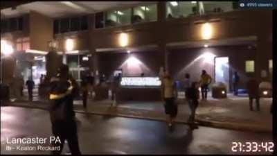 Guy with a megaphone at the Lancaster protests harasses a livestreamer for recording