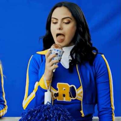 Camilla Mendes, head cheerleader.