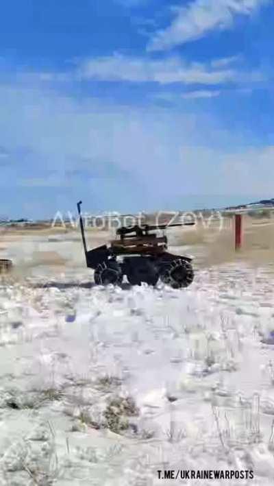 Robot carrying a machine gun and RPGs deployed in Ukraine. Audio from source.