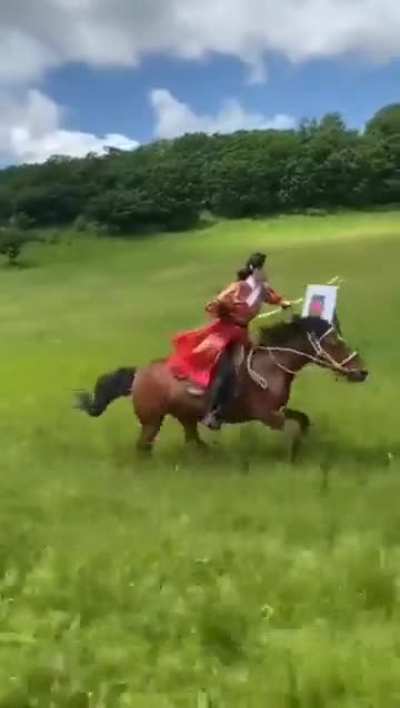 A display of Mongolian horseback archery at a rapid speed, with all 3 targets being hit.