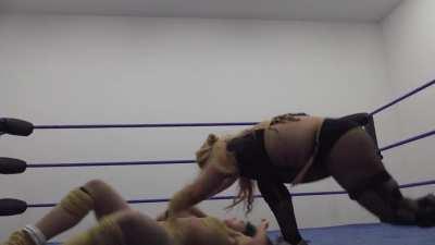 New levels of humiliation, she's hung in a tree of woe with another wrestler's face big used to smash her defenseless stomach