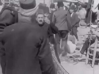 I used an AI to speed correct a video of a man showing off a rug in Damascus, 1936