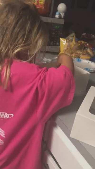 To secretly eat cake without getting caught