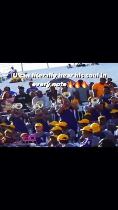 That's how you play a trombone. He puts his soul in it