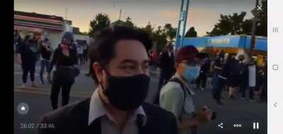 White liberals harass a random Asian man because they think he's Andy Ngo