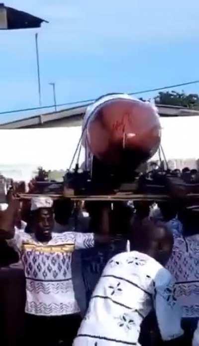 Woman who had 10 kids from 10 men buried in a penis coffin