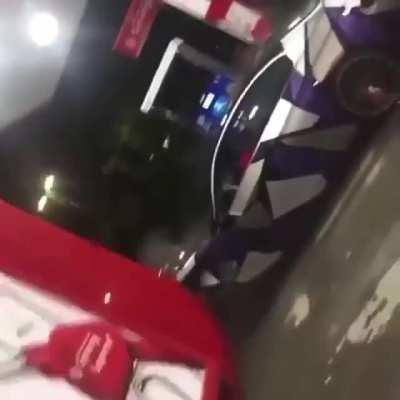 BMW smashing things up at gas station