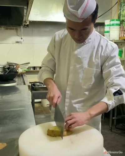 Slicing potato into a thin net