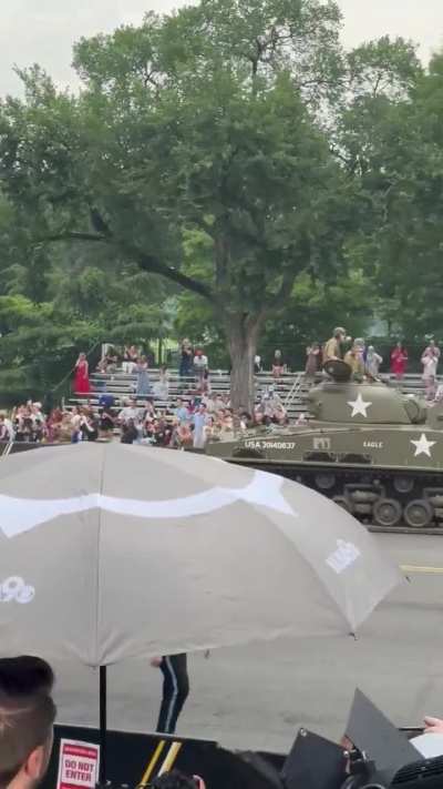 To have packed stands full of enthusiastic people as the tanks roll by at Trump's military parade