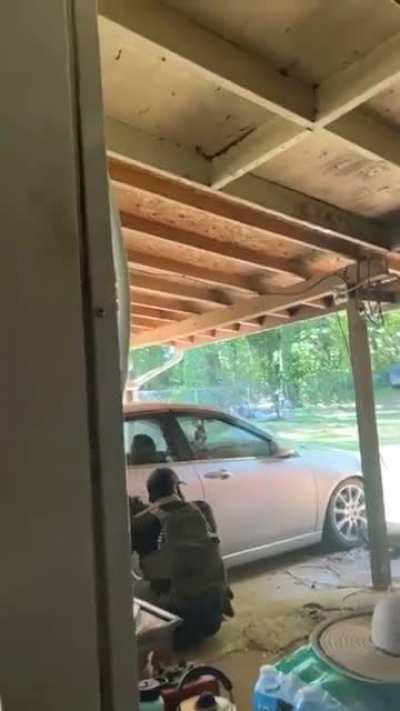 Video from the neighbor next door to the shootout with the cops in Charlotte. 