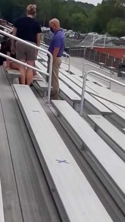 Anti-mask woman resists arrest then is tazed at high school football game.