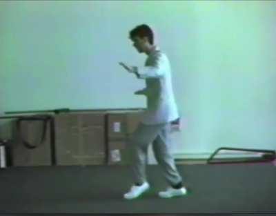 David practicing his dance moves for Stop Making Sense