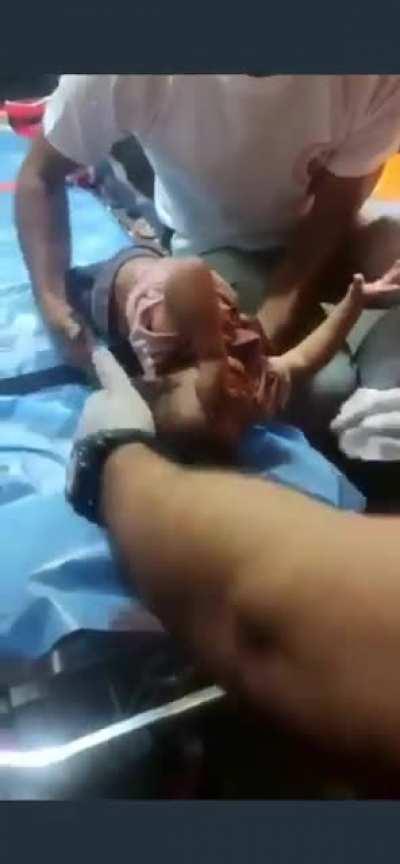 A baby Palestinian girl screams in agony after being pepper sprayed by Israeli forces and Jewish settlers in the occupied West Bank.