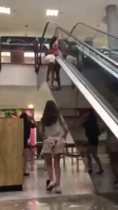 WCGW playing on an escalator