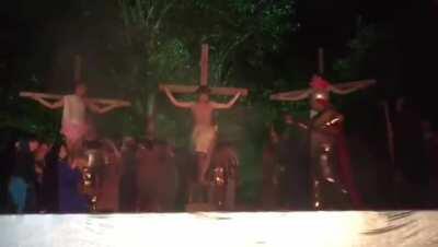 Audience member tries to save Jesus from crucifixion