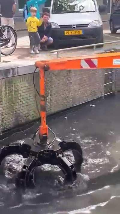 Finding some surprises while cleaning the canals of Amsterdam