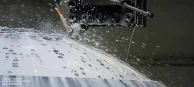 Forging two titanium hemispheres for the first Deep Submergence Vehicle that visited bottom of all five of the world's oceans